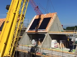 Klimaatgarant Solar start uitlevering prefab in dak geïntegreerde zonnepanelen